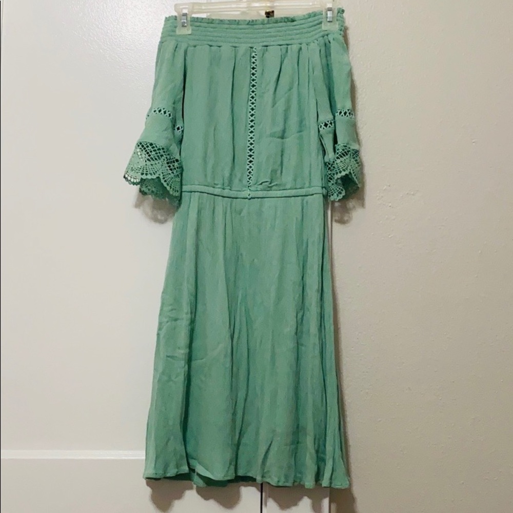Mint off the shoulder dress. Knee length.